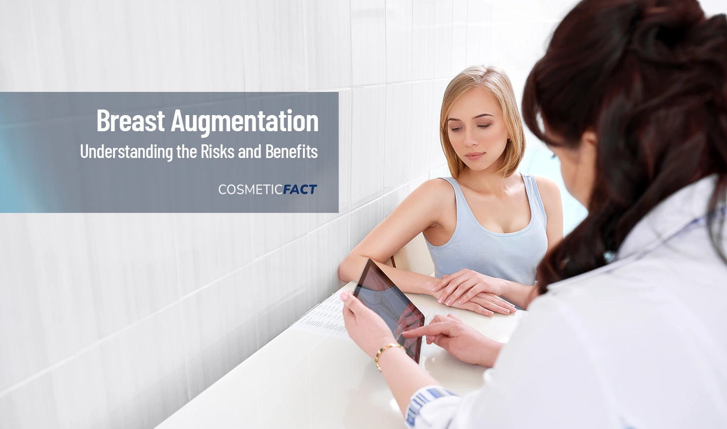 A doctor discusses breast augmentation risks with a client during a consultation.