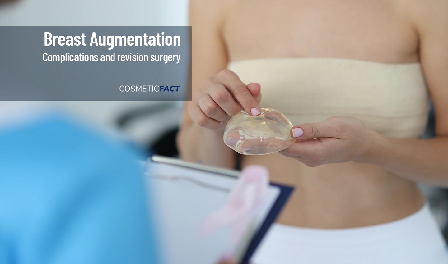 Woman holding breast prosthesis, considering breast augmentation revision surgery.