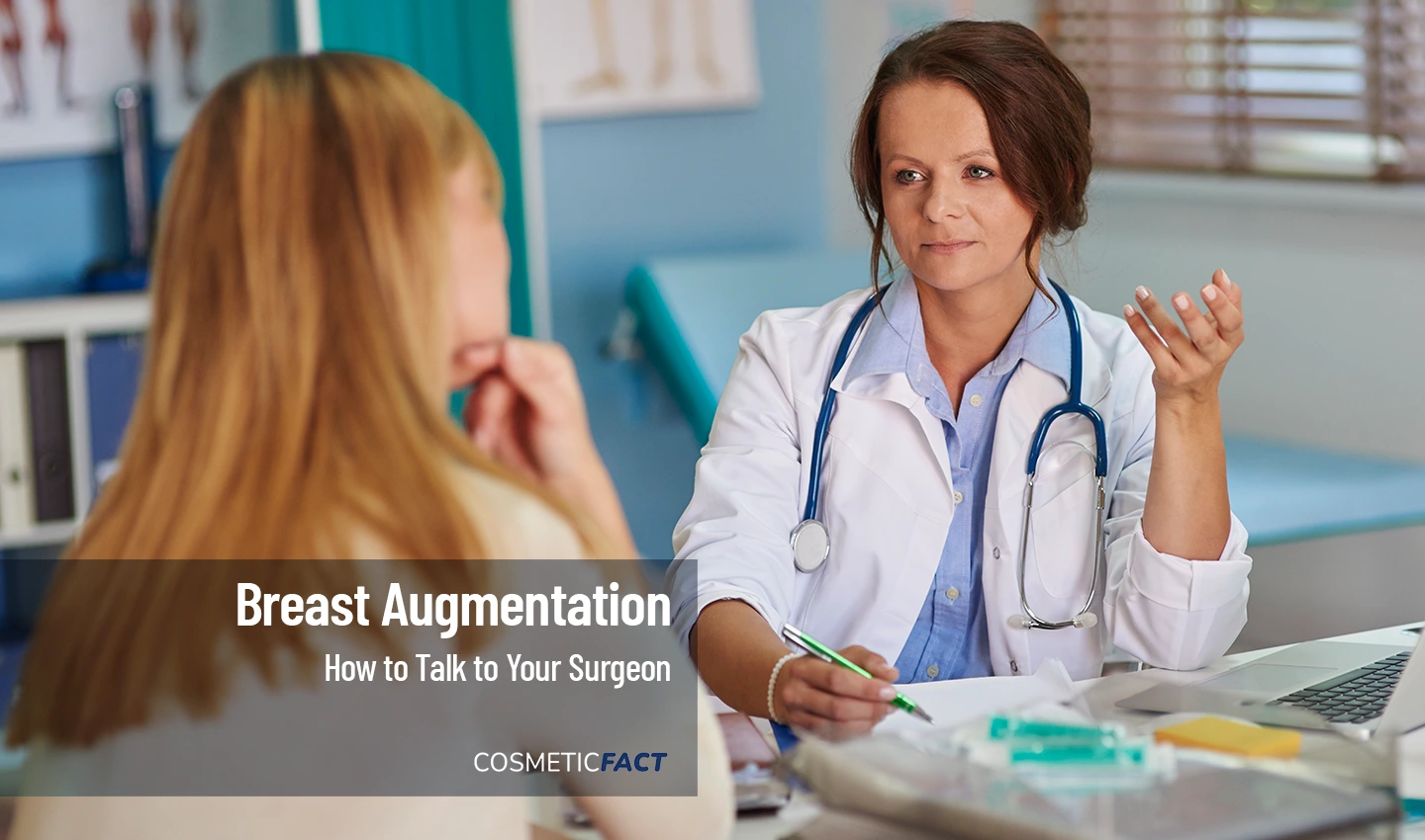 A doctor talking to a patient about their breast augmentation expectations in a consultation room.