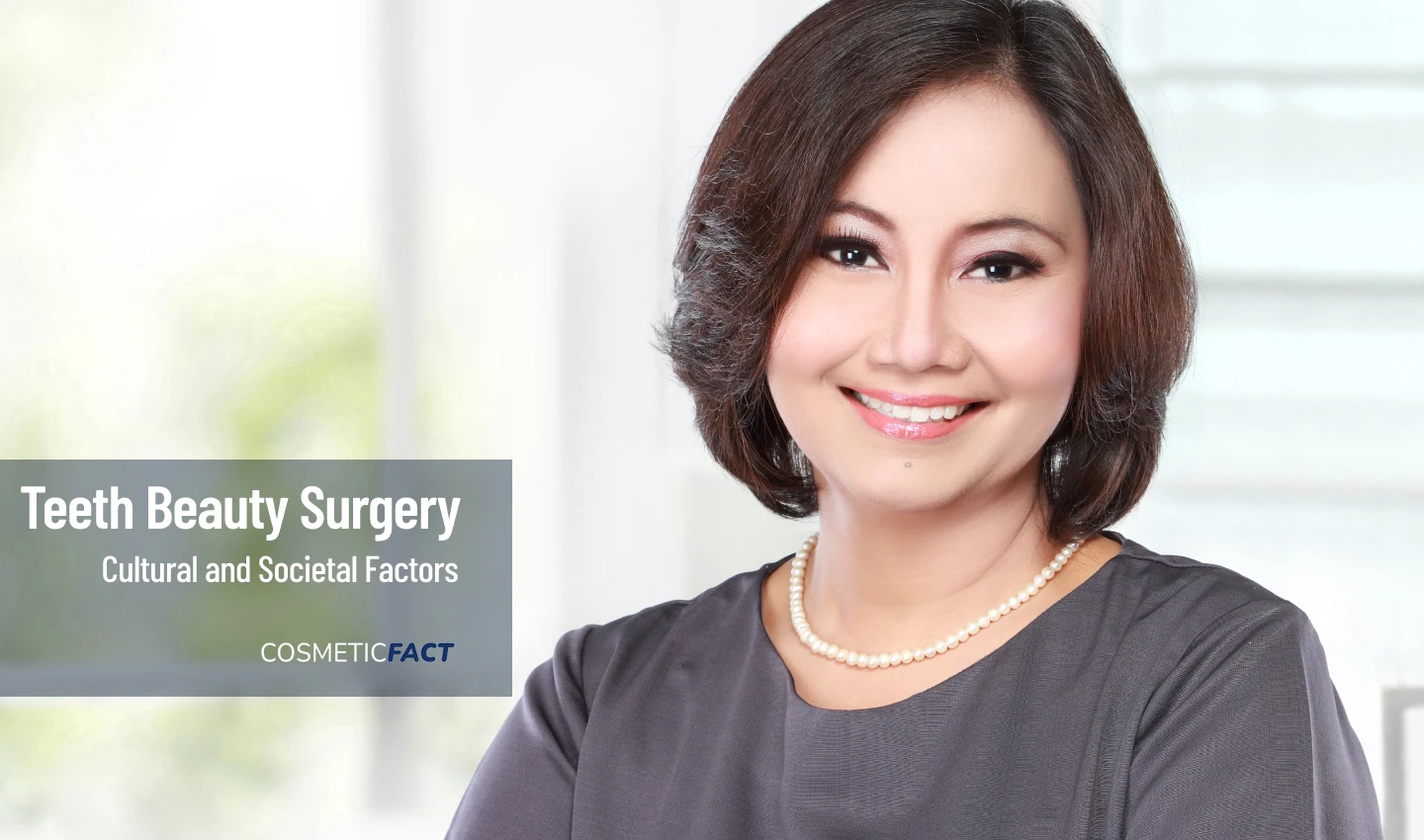 An Oriental middle-aged woman smiling to the camera with straightened and whitened teeth, representing the global phenomenon of teeth beauty surgery.