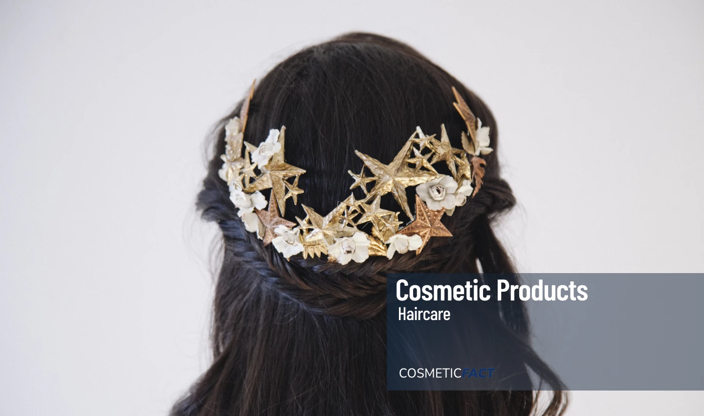 "A woman's hair styled with glamorous hair accessories, including sparkling clips and headbands, perfect for adding shine to any party look