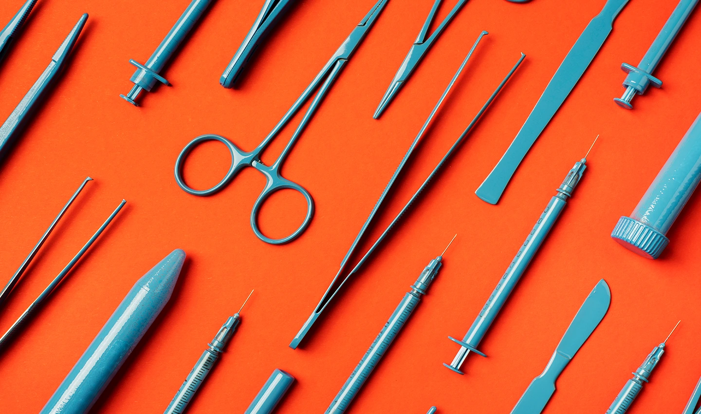 Image of operating room supplies including gauze, scalpels, syringes, and suture materials for preventing and managing Rhinoplasty complications