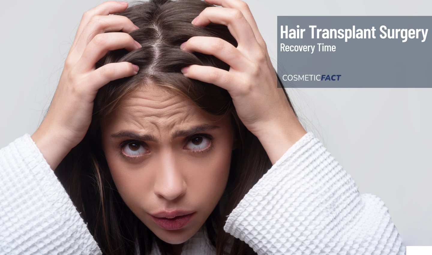 Image of a worried woman touching her loose hair, representing the emotional impact of hair loss and the importance of recovery time after hair loss treatment.