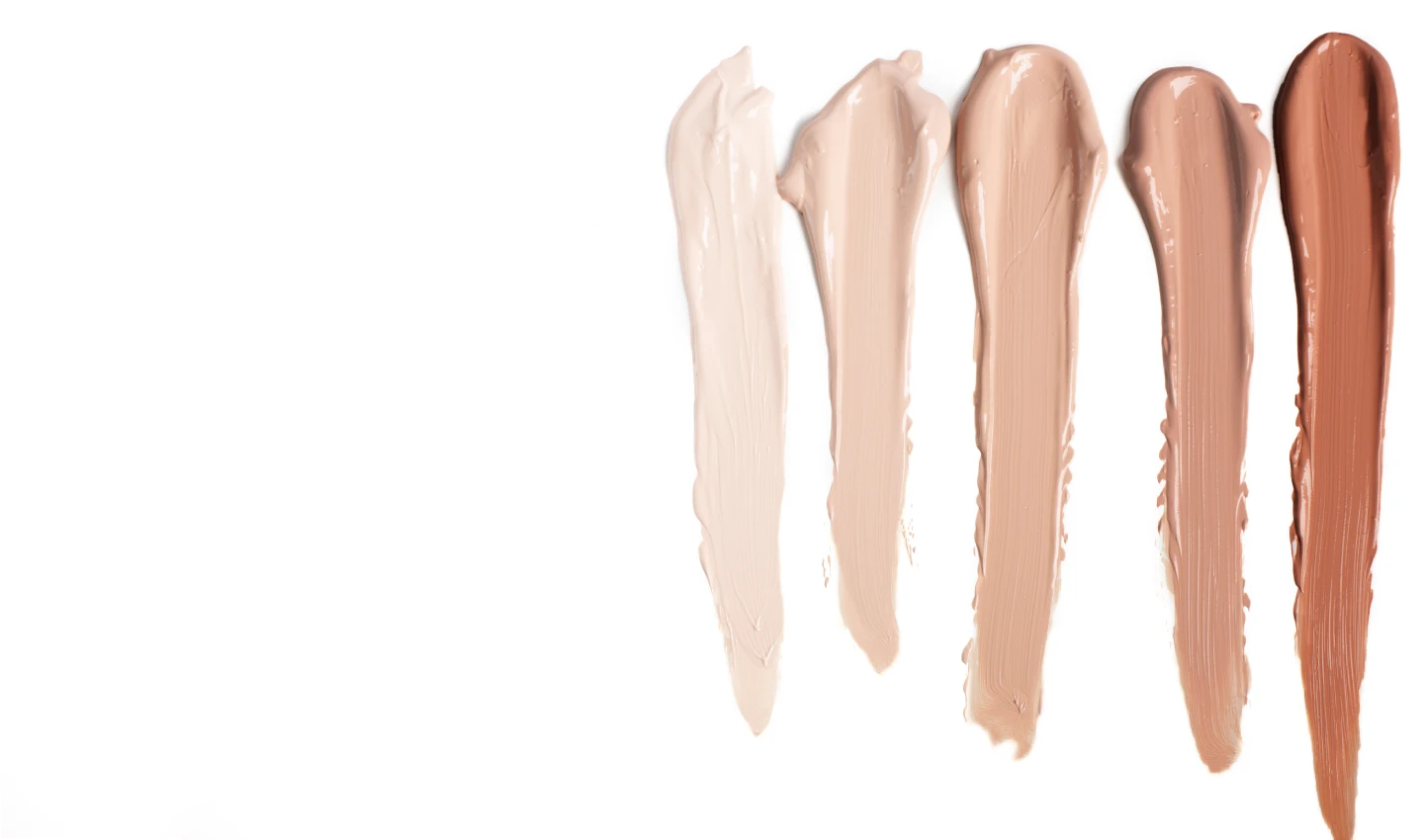 A selection of foundation shades in various colors and undertones, representing the importance of matching foundation undertones for a perfect complexion.