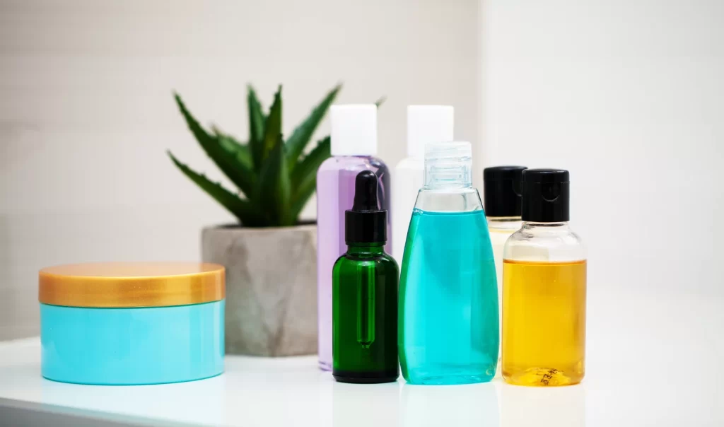Skincare toners of different brands and types are arranged on a table, highlighting the importance of choosing the right toner for your skin type.