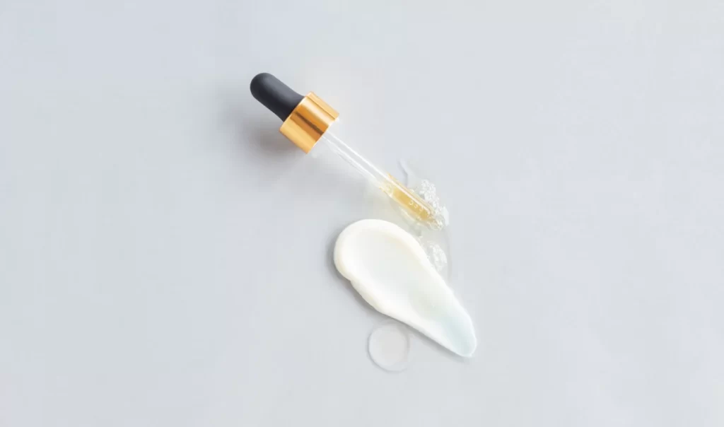 Side-by-side comparison of an eye serum and an eye cream, showing their differences in texture and consistency.