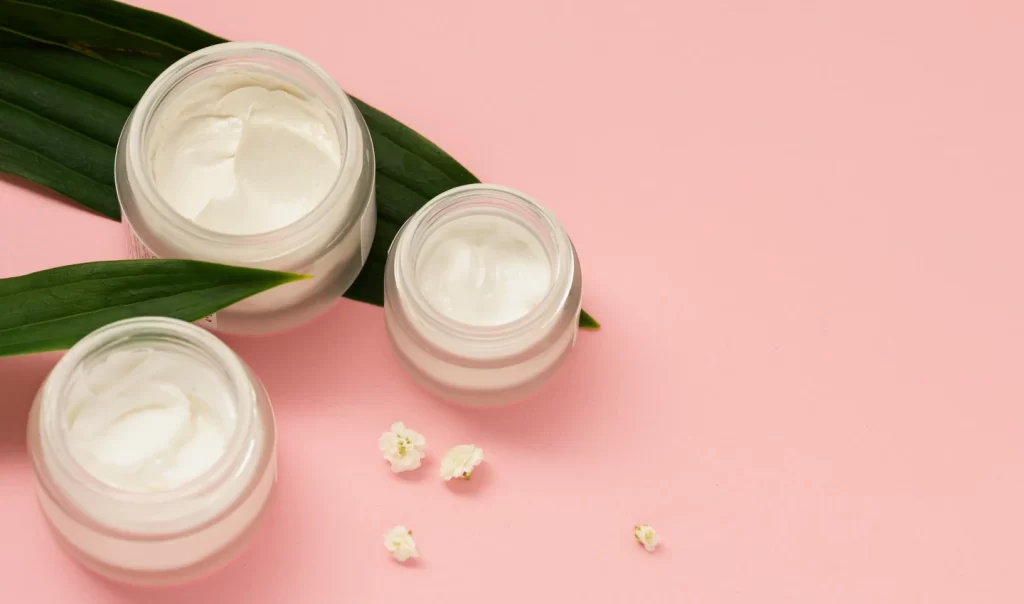 Natural and Organic Skincare Products for a Clean Beauty Routine - includes Herbivore Botanicals Blue Tansy Resurfacing Clarity Mask, Tata Harper Regenerating Cleanser, and Drunk Elephant Protini Polypeptide Cream.