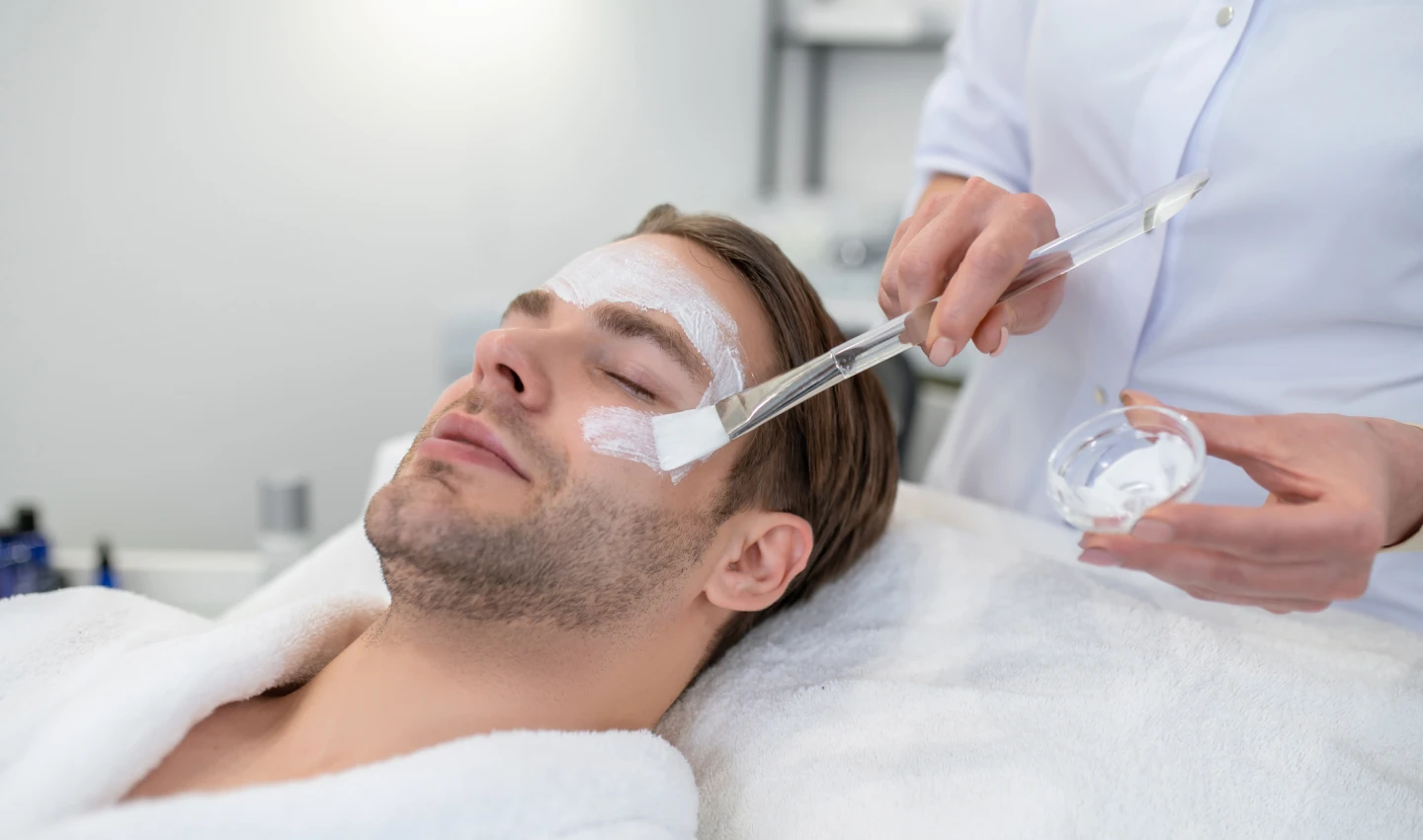 Man undergoing a niacinamide treatment for brighter and smoother skin.
