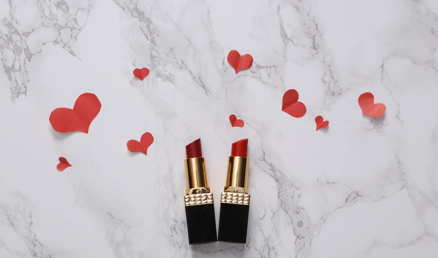 Image of two beautiful red coloured smudge-proof lipsticks perfect for a kiss-proof Valentine's Day makeup look.