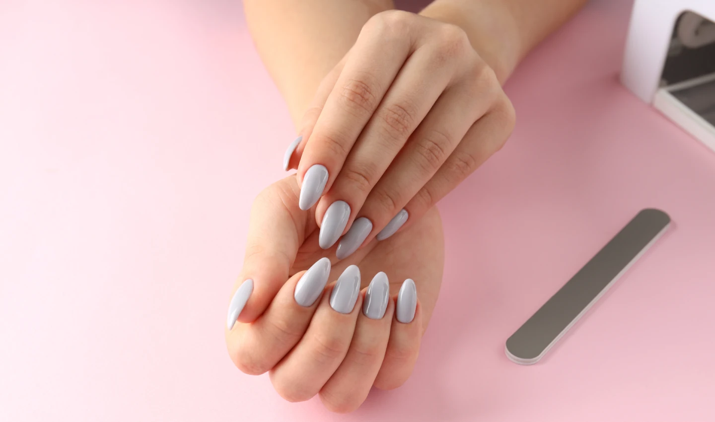 Close-up of beautifully manicured nails, emphasizing the importance of a nail care routine for healthy and gorgeous nails.