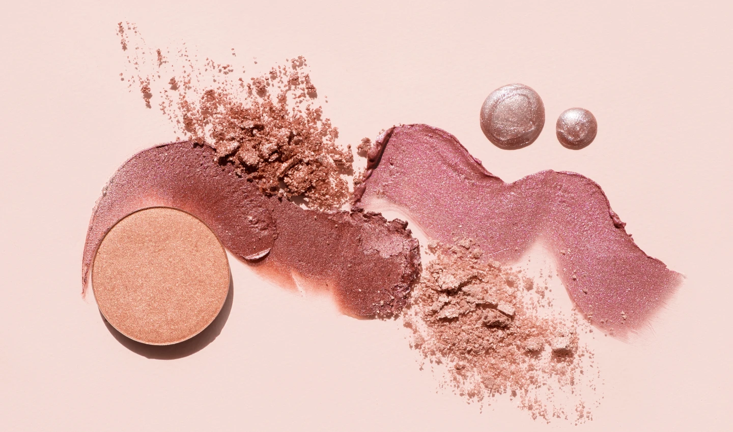 A closeup macro view of different kinds of blushes, showing the various finishes of blush