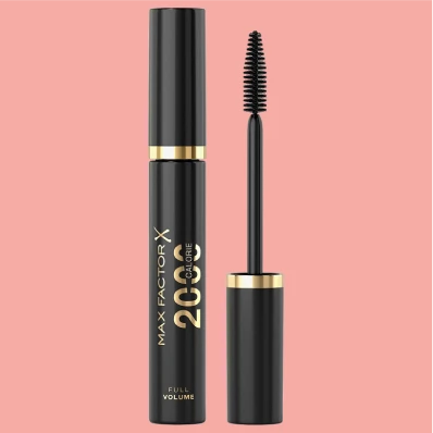 Black tube of MF 2000 Calorie Dramatic Volume Black Mascara with applicator brush beside it, designed to add volume and length to lashes for a dramatic look. Long-lasting and smudge-proof formula ideal for all-day wear.