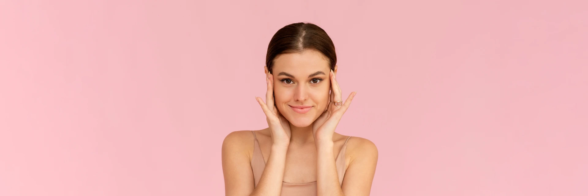 Young woman with smooth skin representing non-surgical face treatments