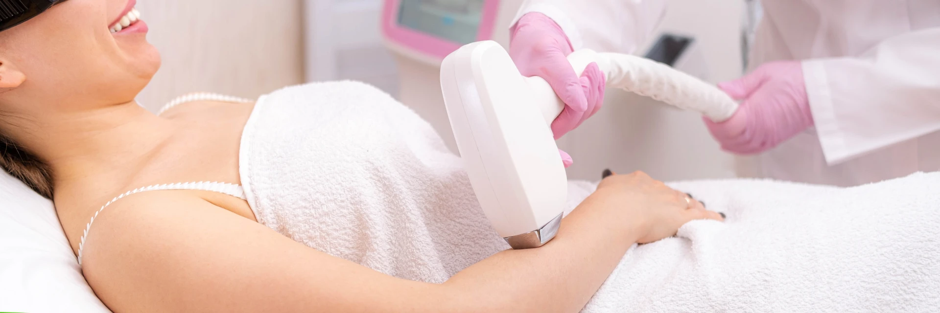 Woman receiving laser cosmetic therapy