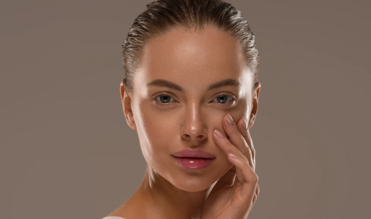 Glowy Skin Makeup - Beauty Woman with Hands, Healthy Natural Make-up, Clean Fresh Skin Concept, Color Background