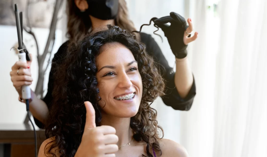 Styling Limp Hair - Woman with Limp Hair Gesturing Approval in a Hairdresser