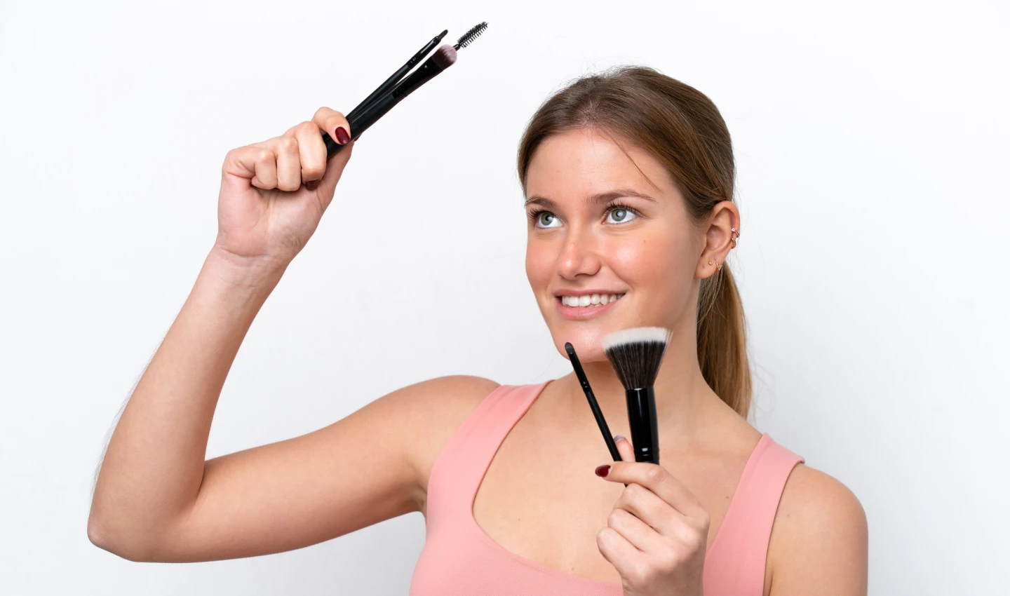 Perfect Concealer Brush - Young Caucasian Woman Holding Makeup Brush