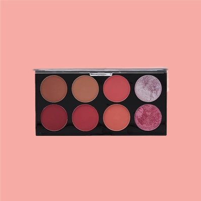 Revolution Ultra Blush Palette Sugar & Spice featuring eight shades of blushes, highlighters, and a contour shade in a black compact