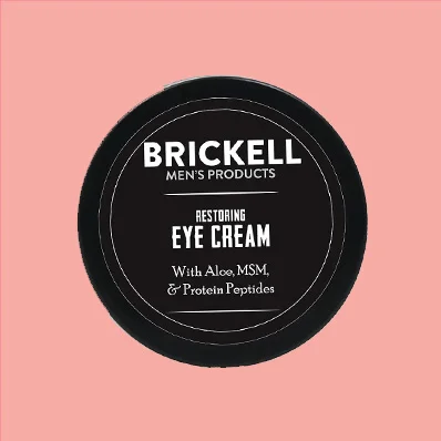 A small jar of Brickell Men's Restoring Eye Cream