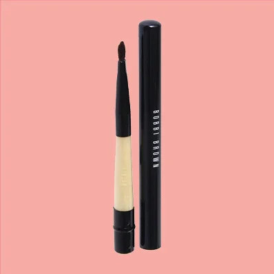 Bobbi Brown Lip Brush with a sleek black handle and a small, tapered brush head