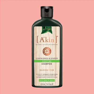 A bottle of A'kin Shampoo for Oily Hair & Scalp Lemongrass & Juniper