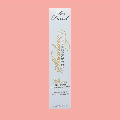 An image of Too Faced Shadow Insurance Anti-Crease Eyeshadow Primer, a makeup product that helps to keep eye makeup in place, paired with eco-friendly bamboo toothbrushes