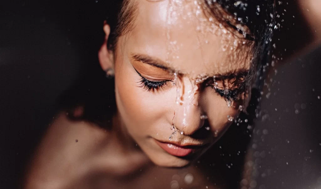 Australian Waterproof Eyeliners - Image of a wet woman with eyeliner makeup