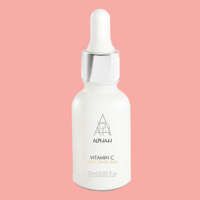 A bottle of Alpha-H Vitamin C Serum, an essential skincare product enriched with Vitamin C