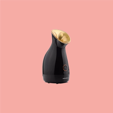 AEROKO Facial Steamer in Black-Gold emitting nano ionic hot mist for deep skin moisturising and cleansing pores, with a blackhead acne remover kit included.
