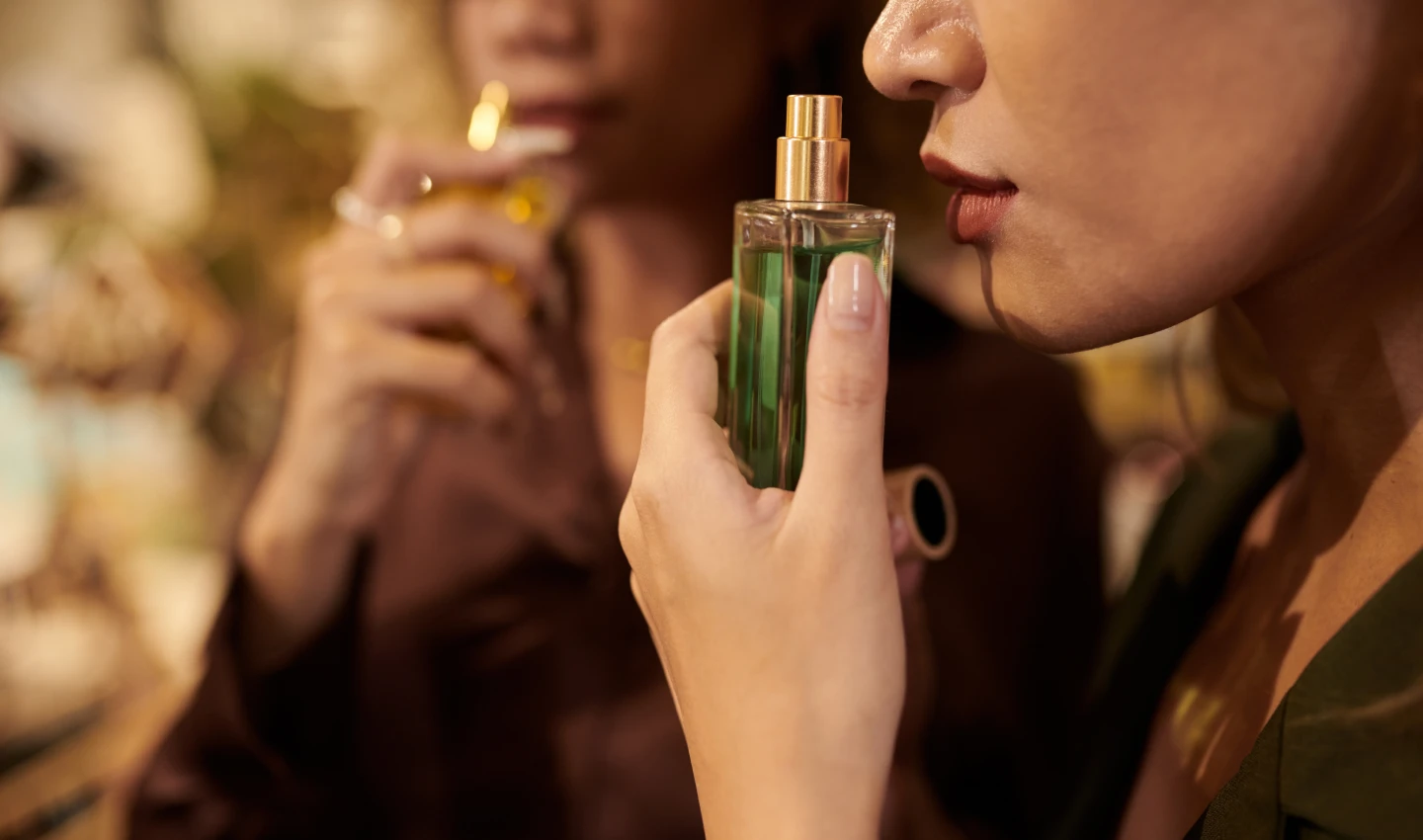 A woman cautiously smelling a perfume, representing the importance of being scent-sible about perfume safety.