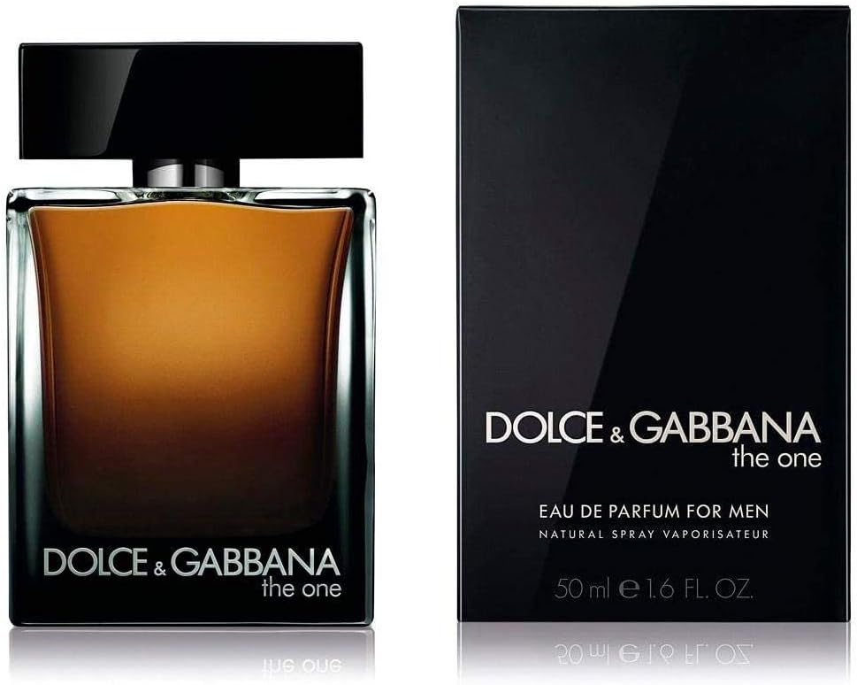 Elegant golden bottle of Dolce & Gabbana The One perfume set against a luxurious background.