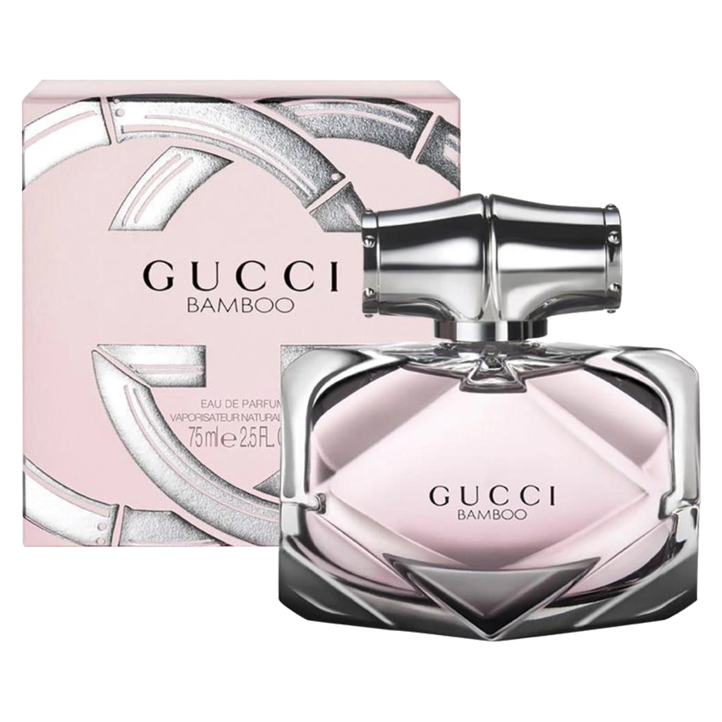 Gucci's Bamboo perfume bottle elegantly displayed on a marble countertop, encapsulating a blend of floral and woody scents.