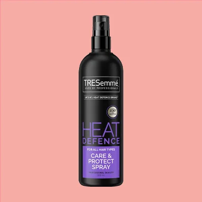 "A bottle of TRESemmé Care & Protect Heat Defence Spray, 300 ml"