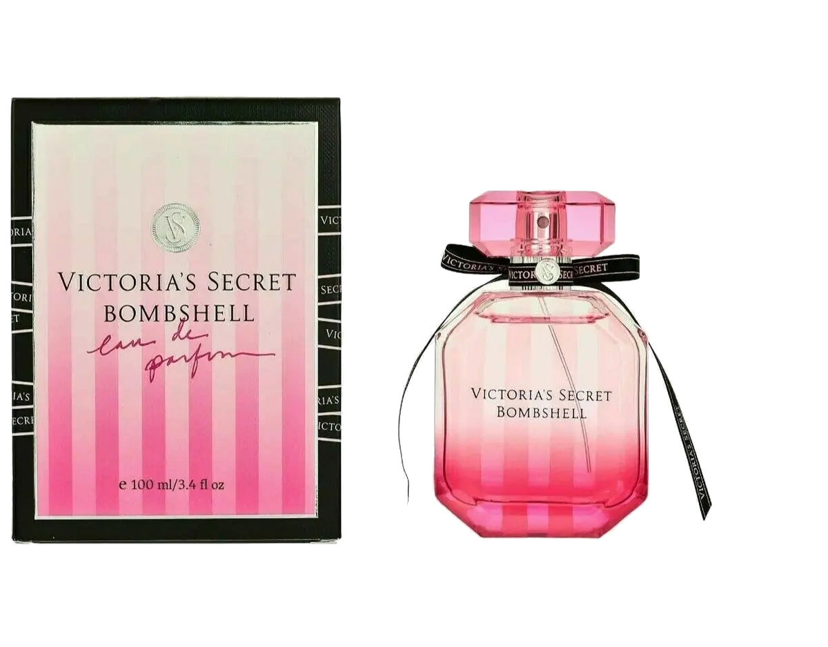 Elegant bottle of Victoria's Secret Bombshell Eau de Parfum on a vanity table, adorned with a pink ribbon.