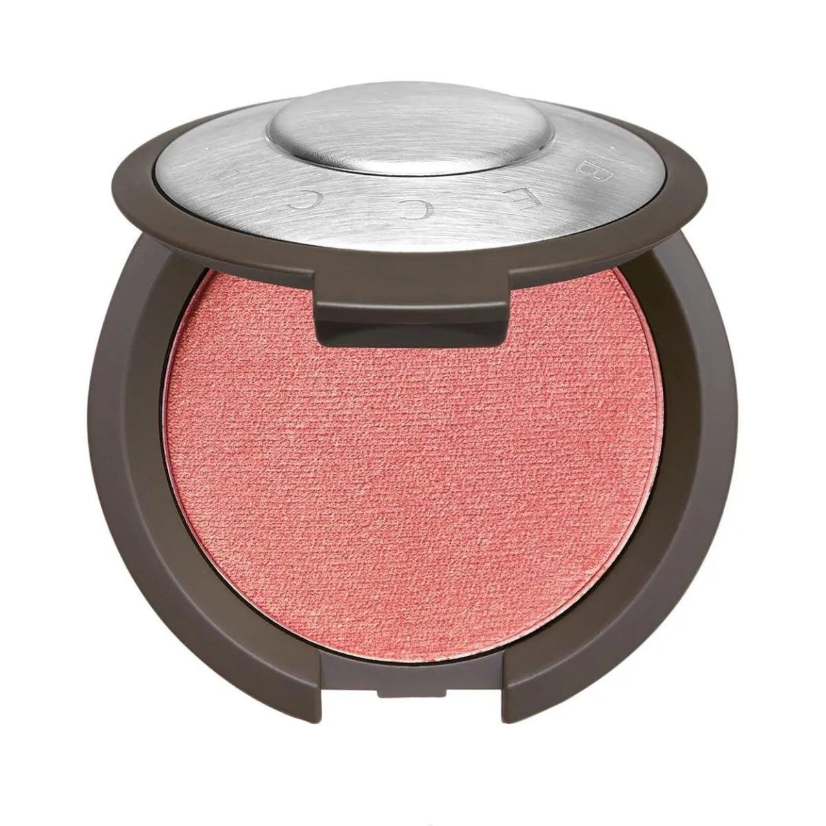 Becca Luminous Blush in Snapdragon - a vivid coral-pink blush compact against a white background.