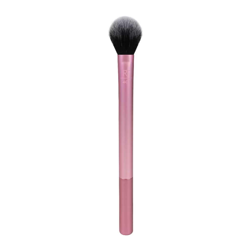 Real Techniques Setting Brush - a makeup setting brush on a white background.