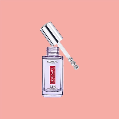 L'Oréal Paris Revitalift Filler Eye Serum bottle, 20 ml, with 2.5% Hyaluronic Acid and Caffeine, on a white background.