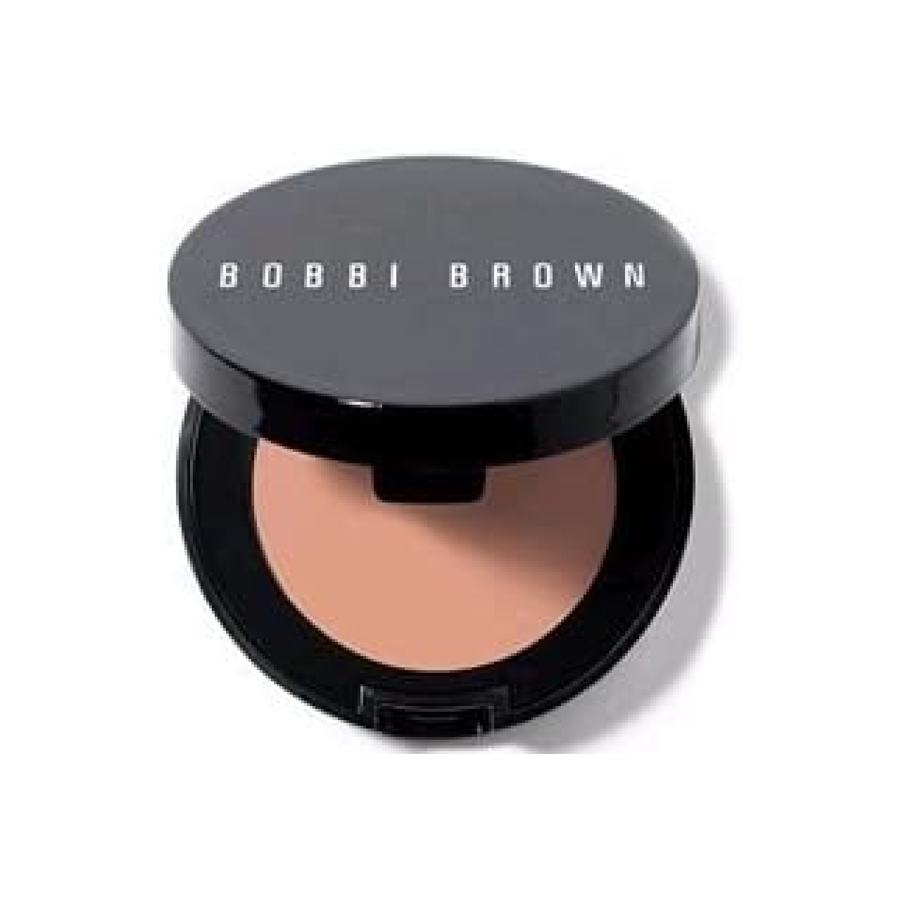 Open compact of Bobbi Brown's Under Eye Corrector displayed on a clean white surface