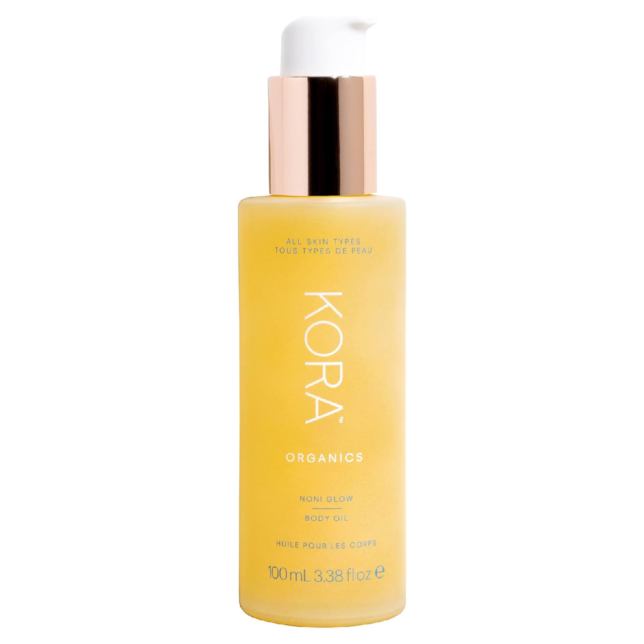 Elegant bottle of KORA Organics Noni Glow Body Oil displayed on a soft backdrop