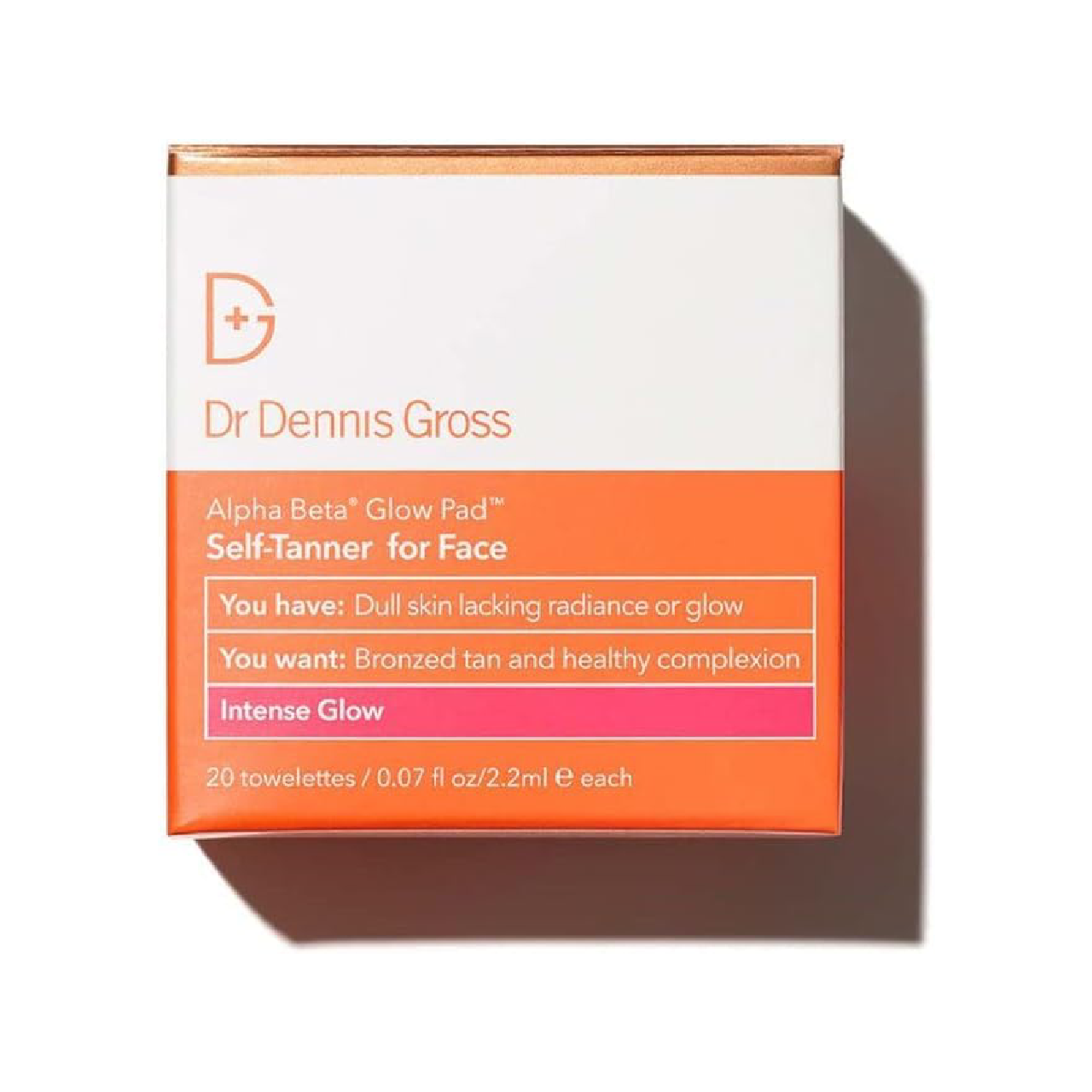 Single pre-soaked towelette of Dr. Dennis Gross Alpha Beta® Glow Pad for Face against a white background.